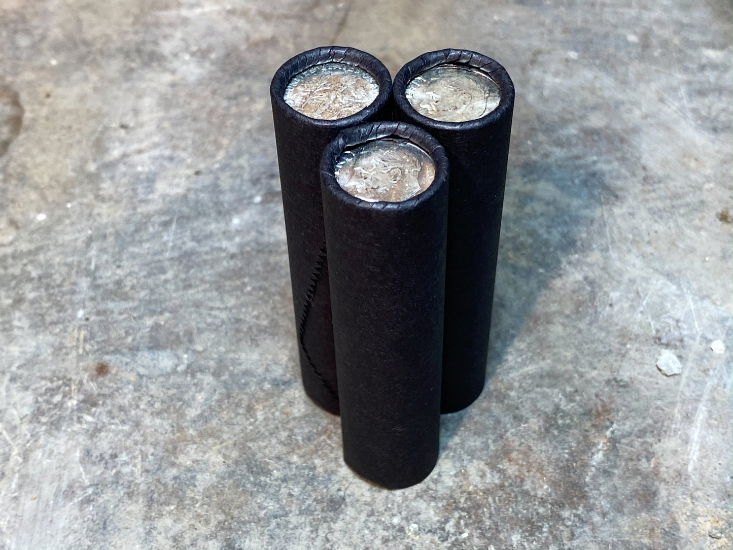 UNCIRCULATED SILVER DIME showing on end of old black unsearched wheat penny roll cent lot estate sale hoard coins collection