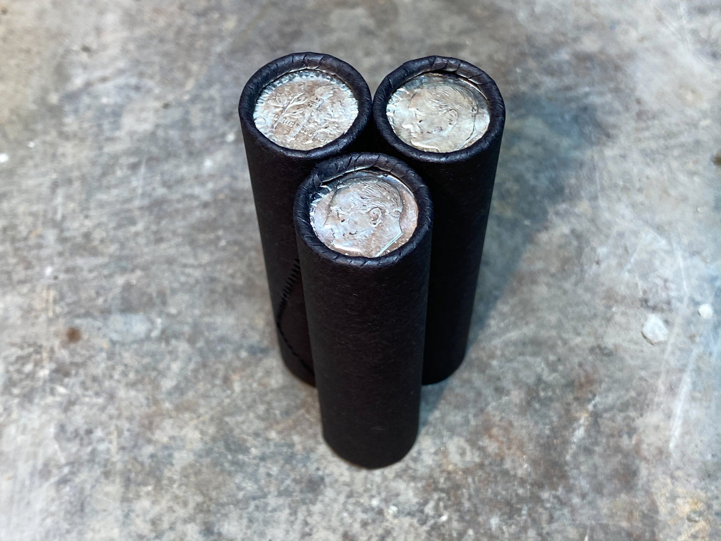 UNCIRCULATED SILVER DIME showing on end of old black unsearched wheat penny roll cent lot estate sale hoard coins collection