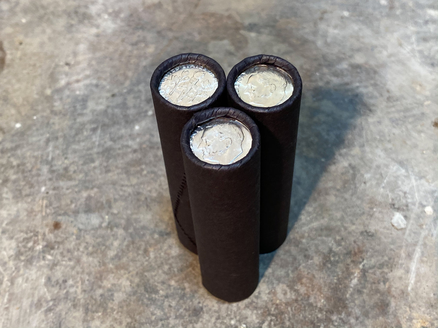 UNCIRCULATED SILVER DIME showing on end of old black unsearched wheat penny roll cent lot estate sale hoard coins collection