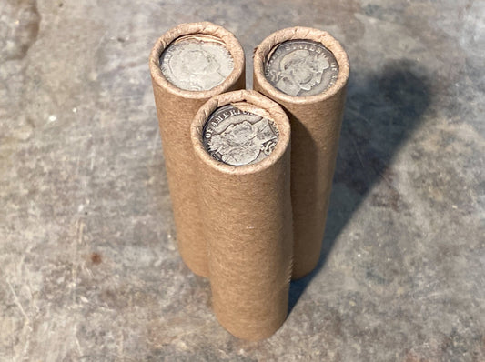 SILVER BARBER DIME showing on end of old brown vintage us wheat cent coin penny roll lot estate money sale cents hoard