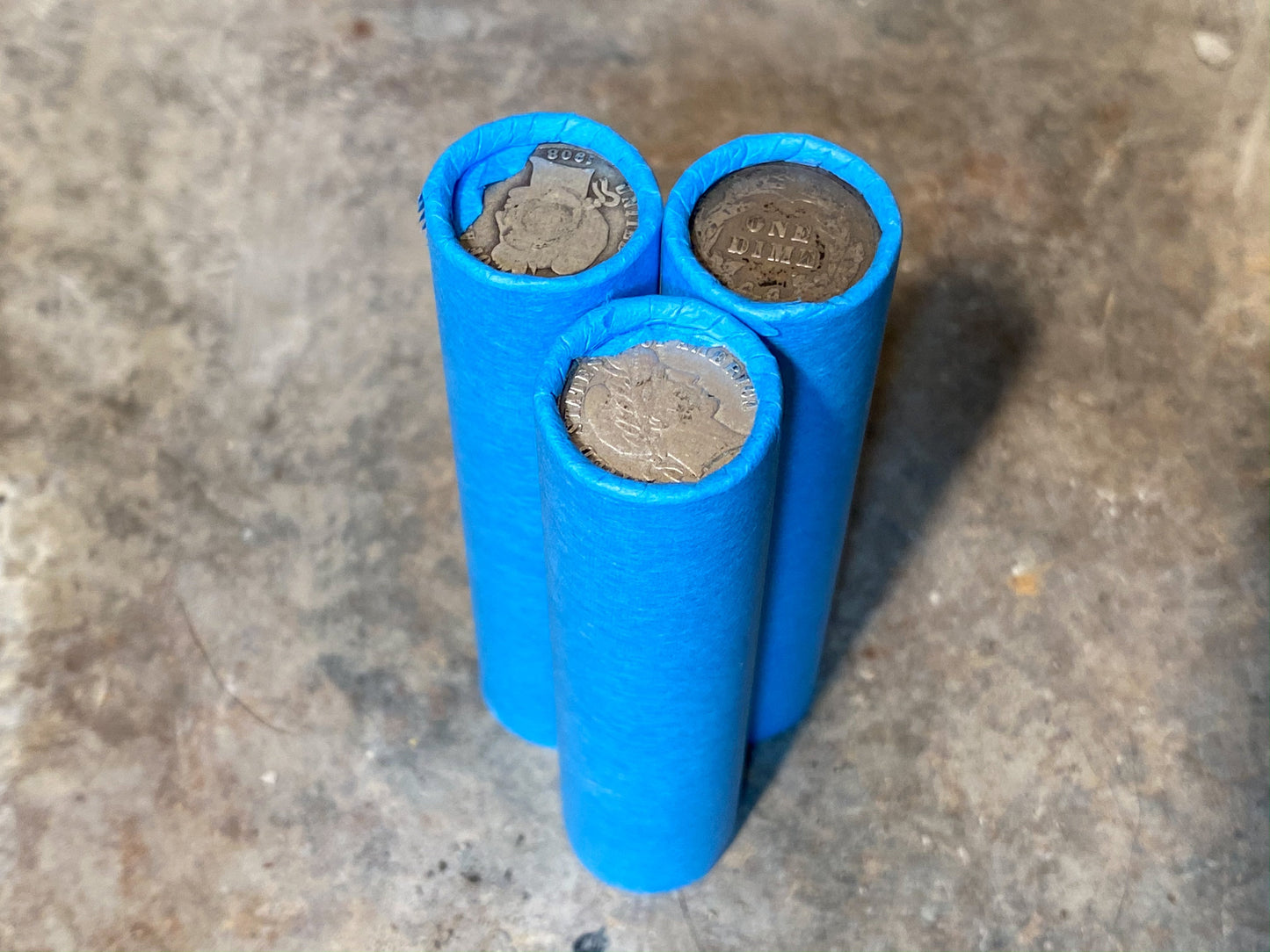 SILVER BARBER DIME showing on end of blue old vintage us wheat cent coin penny roll lot estate money sale cents hoard