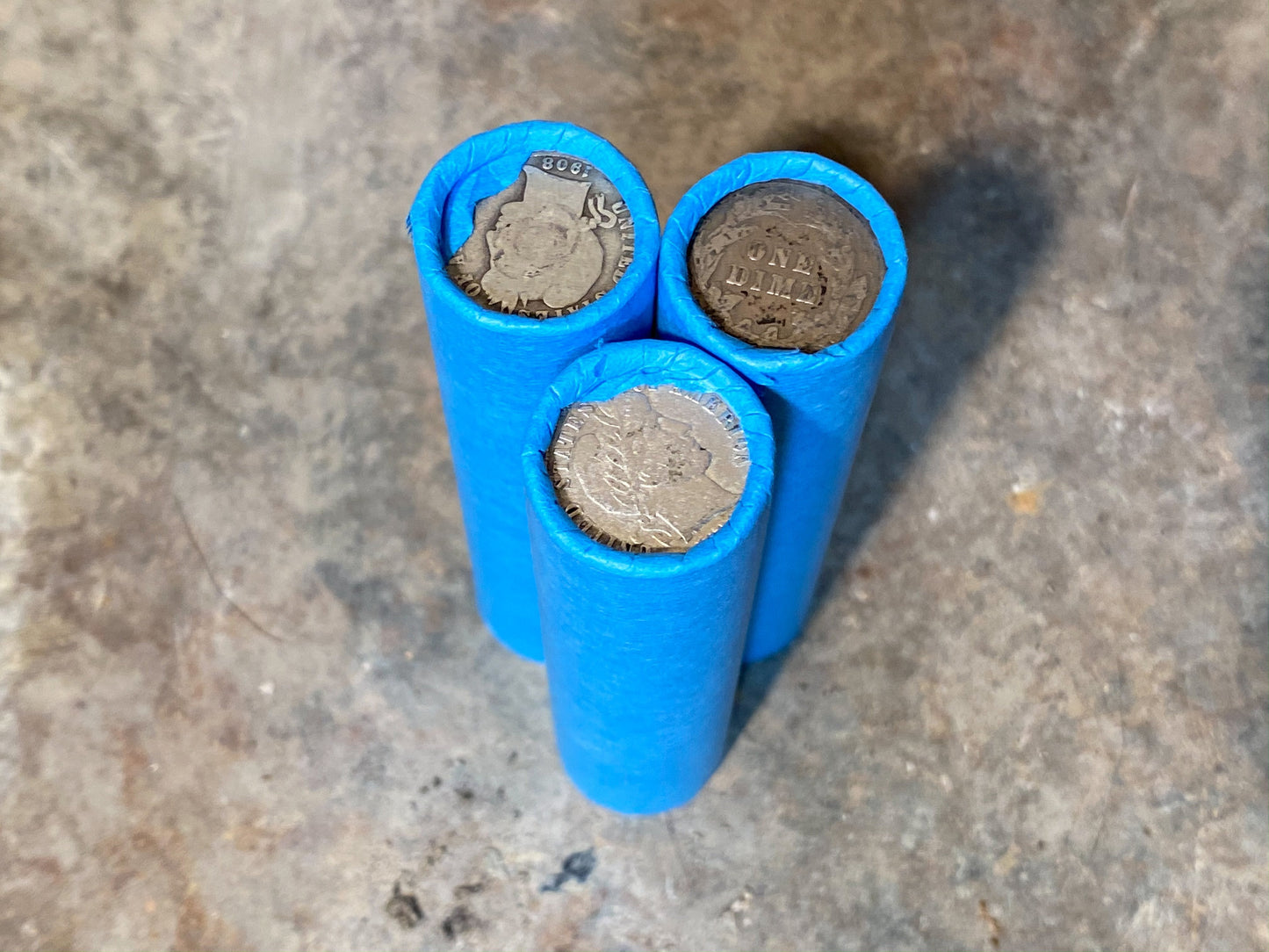 SILVER BARBER DIME showing on end of blue old vintage us wheat cent coin penny roll lot estate money sale cents hoard