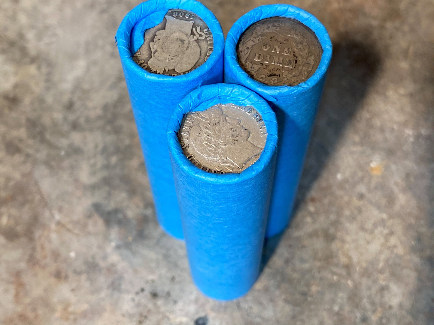 SILVER BARBER DIME showing on end of blue old vintage us wheat cent coin penny roll lot estate money sale cents hoard
